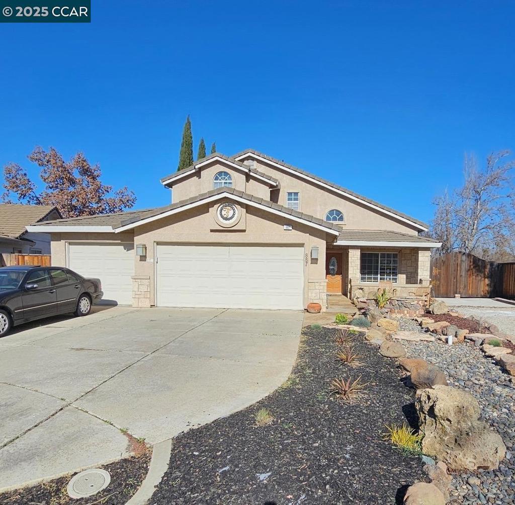 view of front of house with a garage