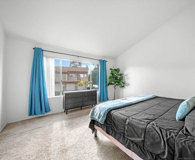 bedroom with vaulted ceiling