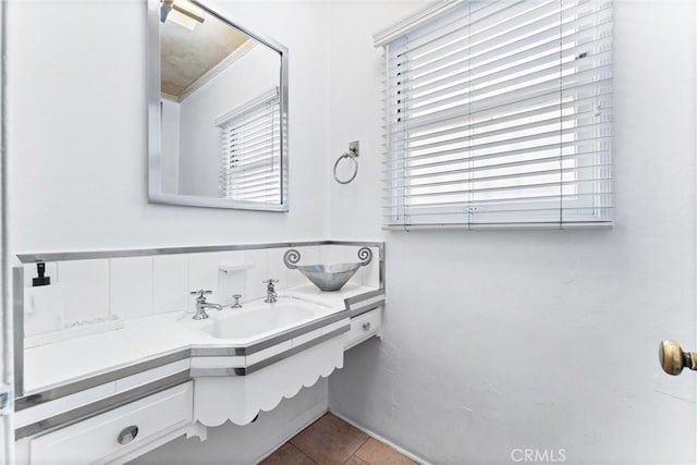 bathroom featuring tile patterned floors and sink