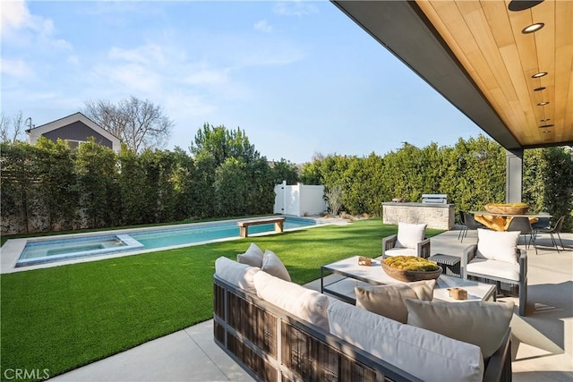 view of pool featuring an in ground hot tub, a yard, an outdoor hangout area, and a patio