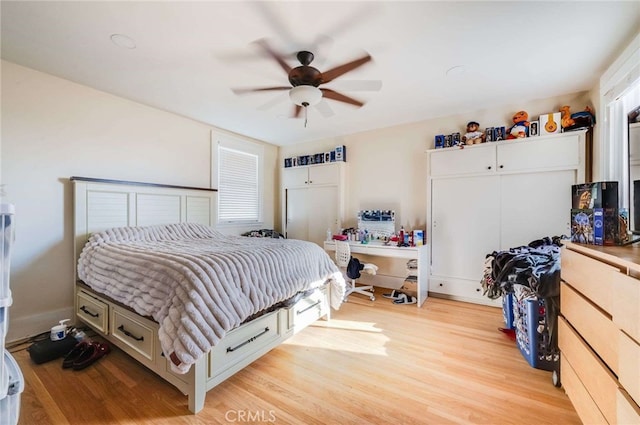 bedroom featuring ceiling fan and light wood-type flooring