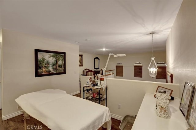 bedroom with wood-type flooring