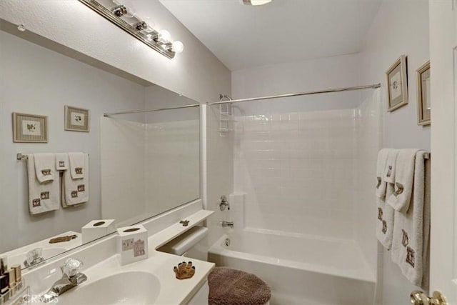 full bathroom with vanity, bathtub / shower combination, and toilet