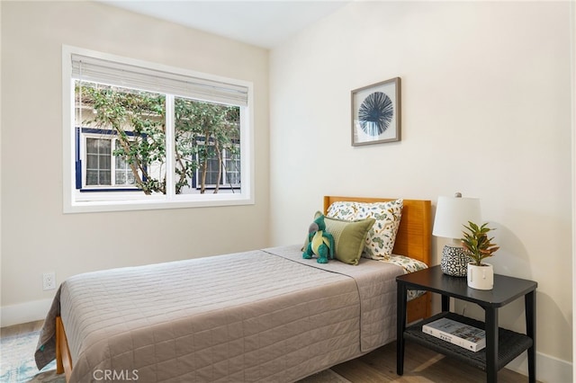 bedroom featuring hardwood / wood-style floors