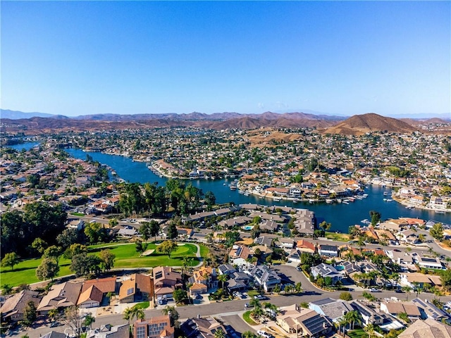 aerial view with a water and mountain view