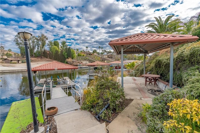 dock area with a water view