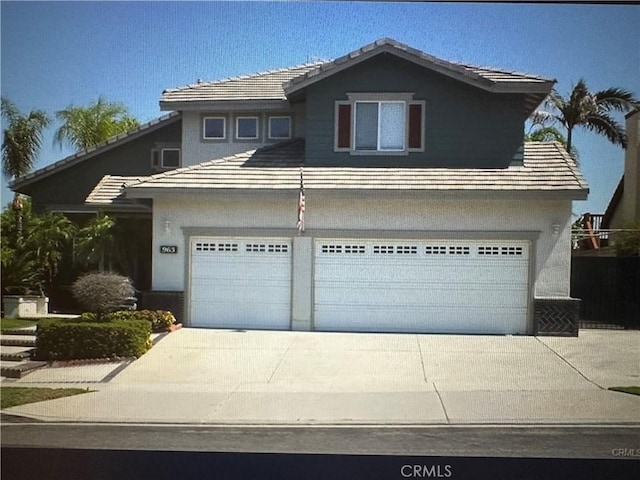 front of property featuring a garage