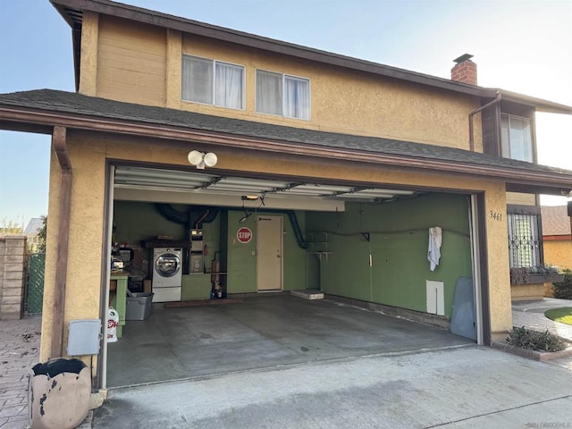 garage featuring washer / dryer