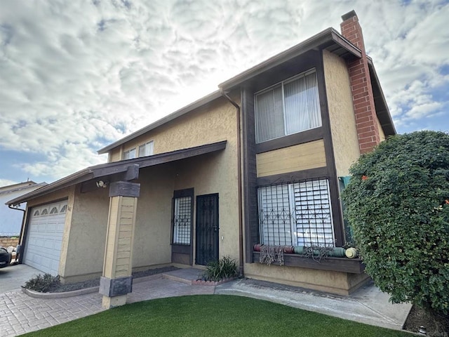 view of front of property with a garage