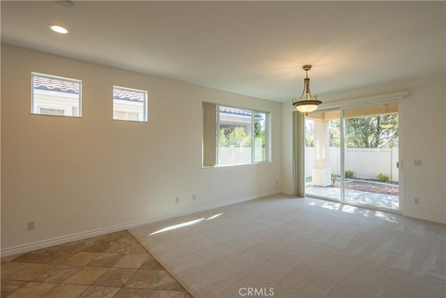 unfurnished room with carpet