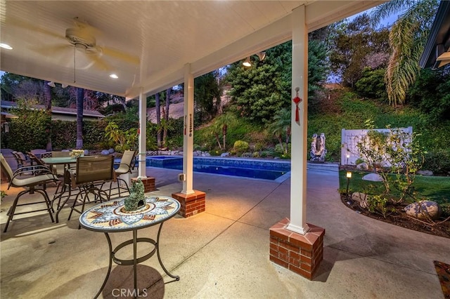 view of patio featuring ceiling fan