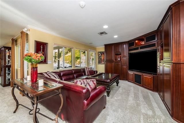 carpeted living room with crown molding