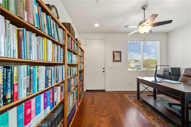 office featuring dark wood-type flooring and ceiling fan