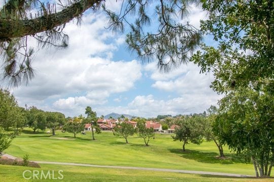 view of community featuring a lawn