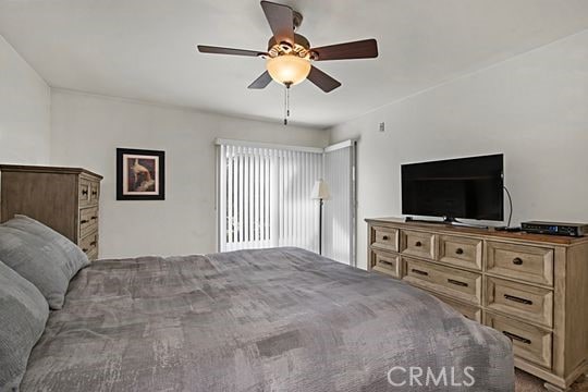 bedroom featuring ceiling fan