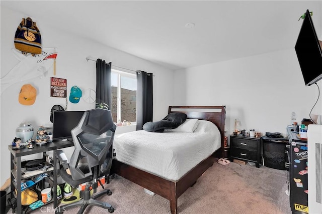 bedroom featuring carpet