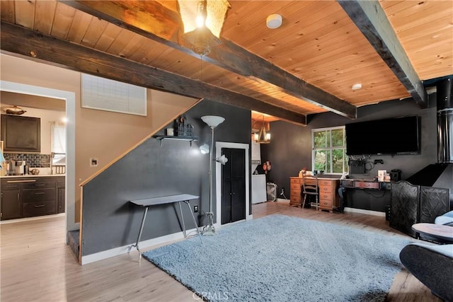 living room with wood ceiling, beam ceiling, and light hardwood / wood-style floors