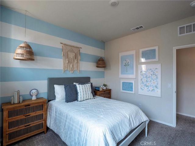 bedroom featuring dark carpet