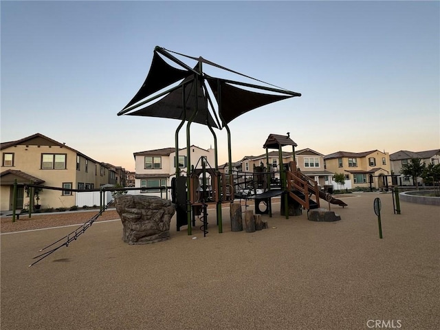 view of playground at dusk