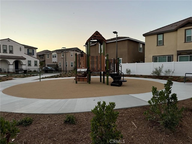 view of playground at dusk