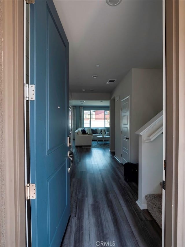 interior space featuring dark wood-type flooring