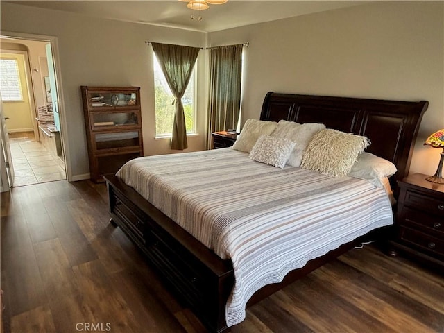 bedroom featuring wood finished floors