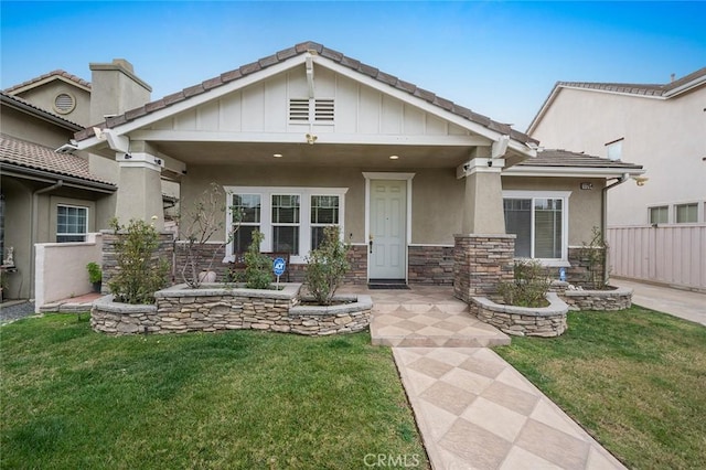 view of front of home with a front lawn