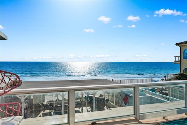 view of water feature with a beach view