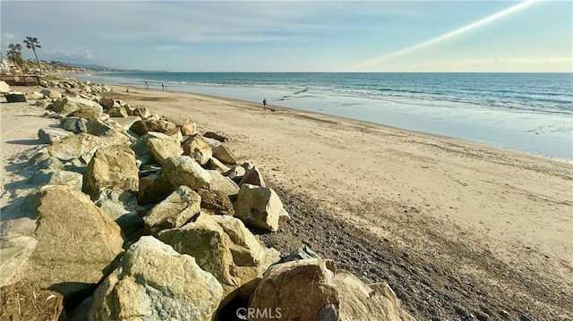 property view of water featuring a view of the beach