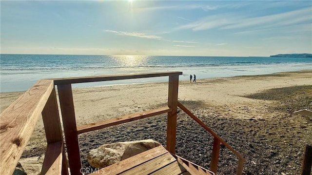 property view of water featuring a beach view