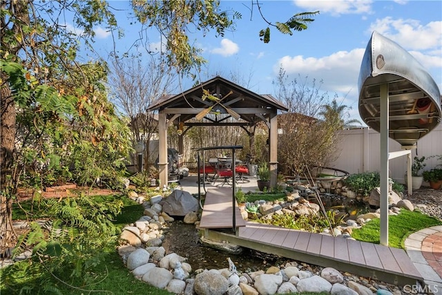 view of home's community featuring a gazebo and a patio area