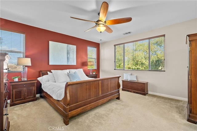 carpeted bedroom featuring ceiling fan