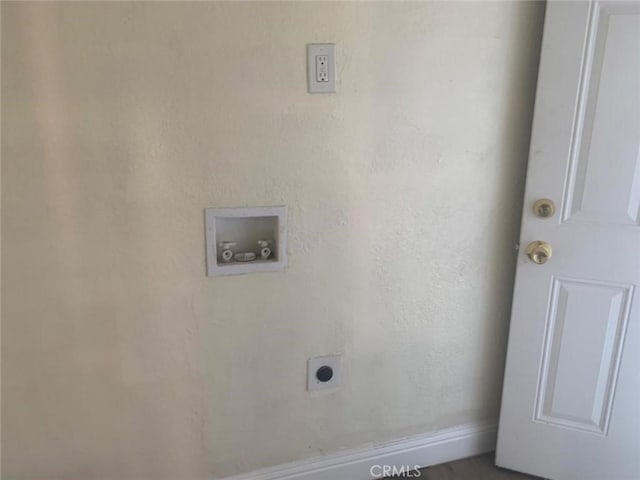 washroom featuring washer hookup and electric dryer hookup