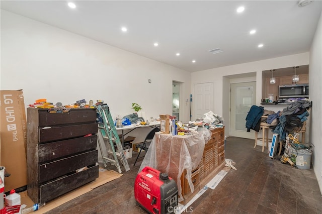 miscellaneous room with dark hardwood / wood-style floors