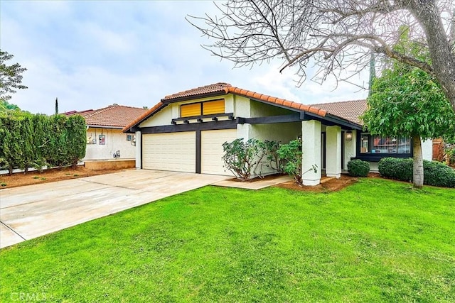 view of front facade with a garage and a front yard