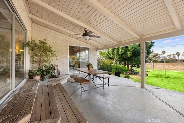 view of patio featuring ceiling fan