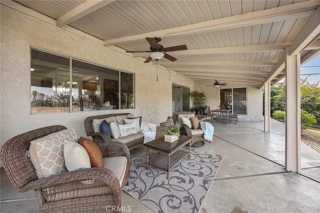 view of patio with an outdoor hangout area and a ceiling fan