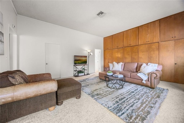 living room featuring carpet floors and visible vents