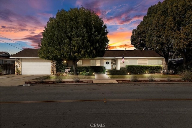 view of front of property with a garage