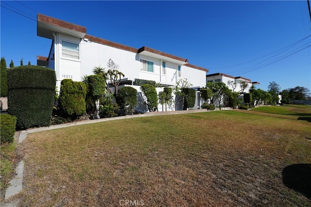 exterior space with a front yard