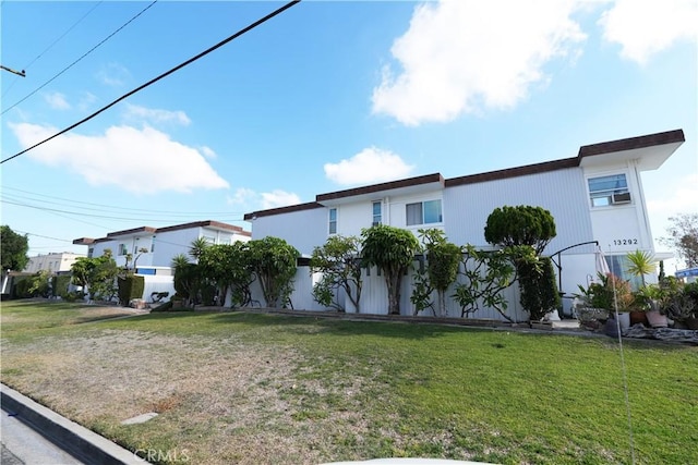 view of front of home with a front yard