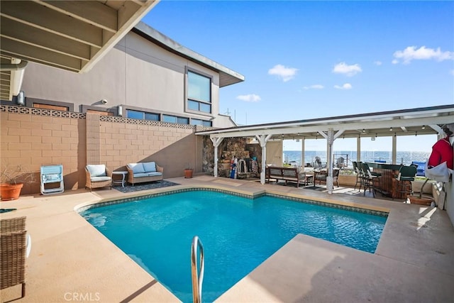 view of pool featuring a patio area