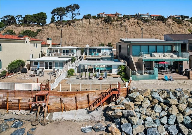 back of property featuring a mountain view