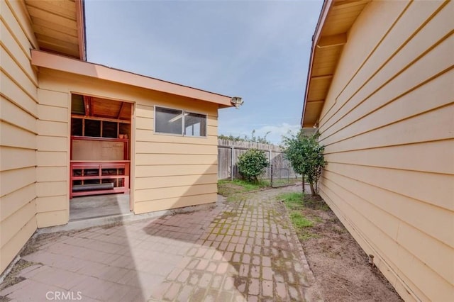 view of property exterior featuring a patio area