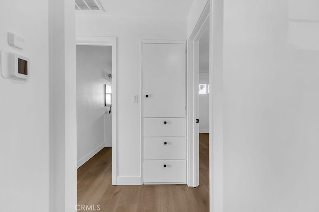 hallway featuring light hardwood / wood-style floors