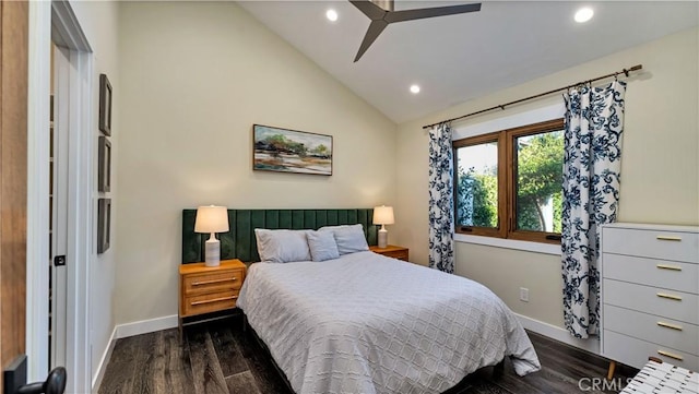 bedroom with lofted ceiling and dark hardwood / wood-style flooring