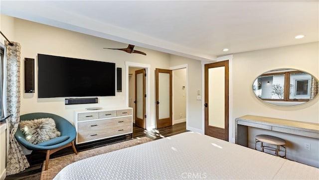 bedroom featuring dark wood-type flooring