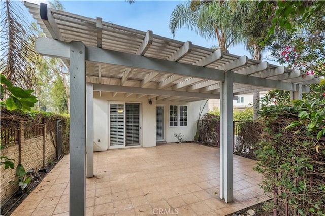 view of patio featuring a pergola