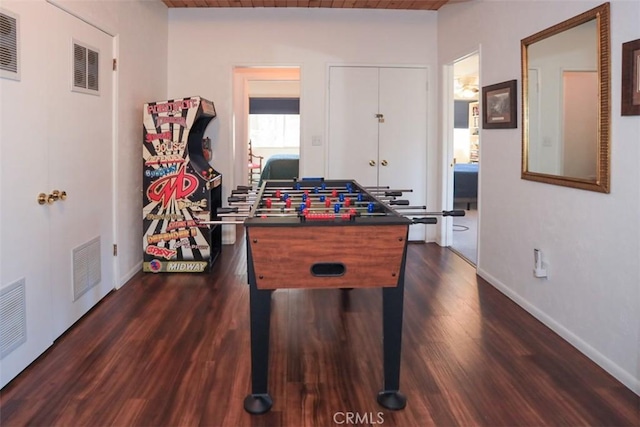 playroom featuring dark hardwood / wood-style flooring