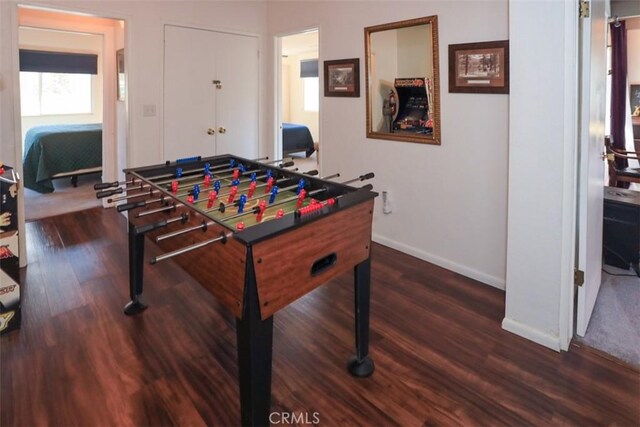 playroom with dark hardwood / wood-style floors